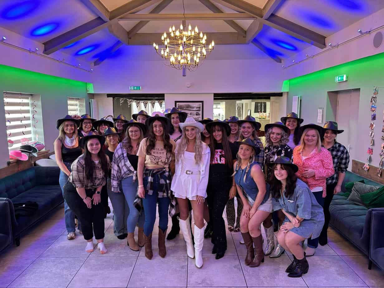 Ladies ready to take part in their fun line dancing hen party dance class