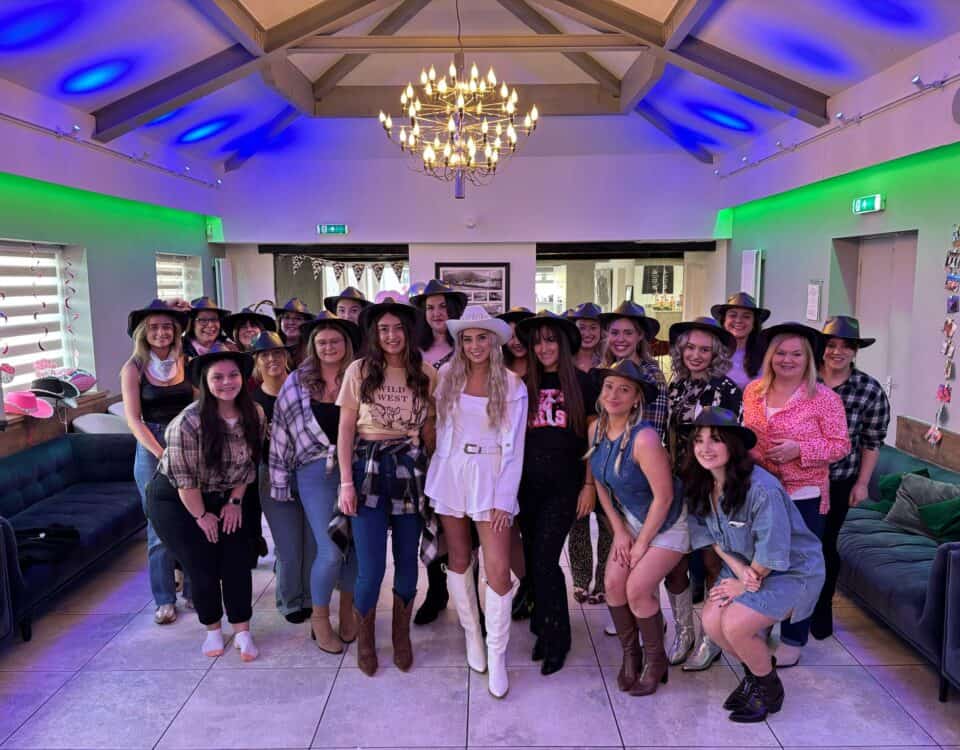 Group of ladies enjoying a cowboy theme hen party! Fun themed ideas for a fab cowboy hen do