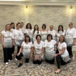 A group enjoying a hen do with fun dance classes, brunch, and games – top hen party ideas for mixed ages.