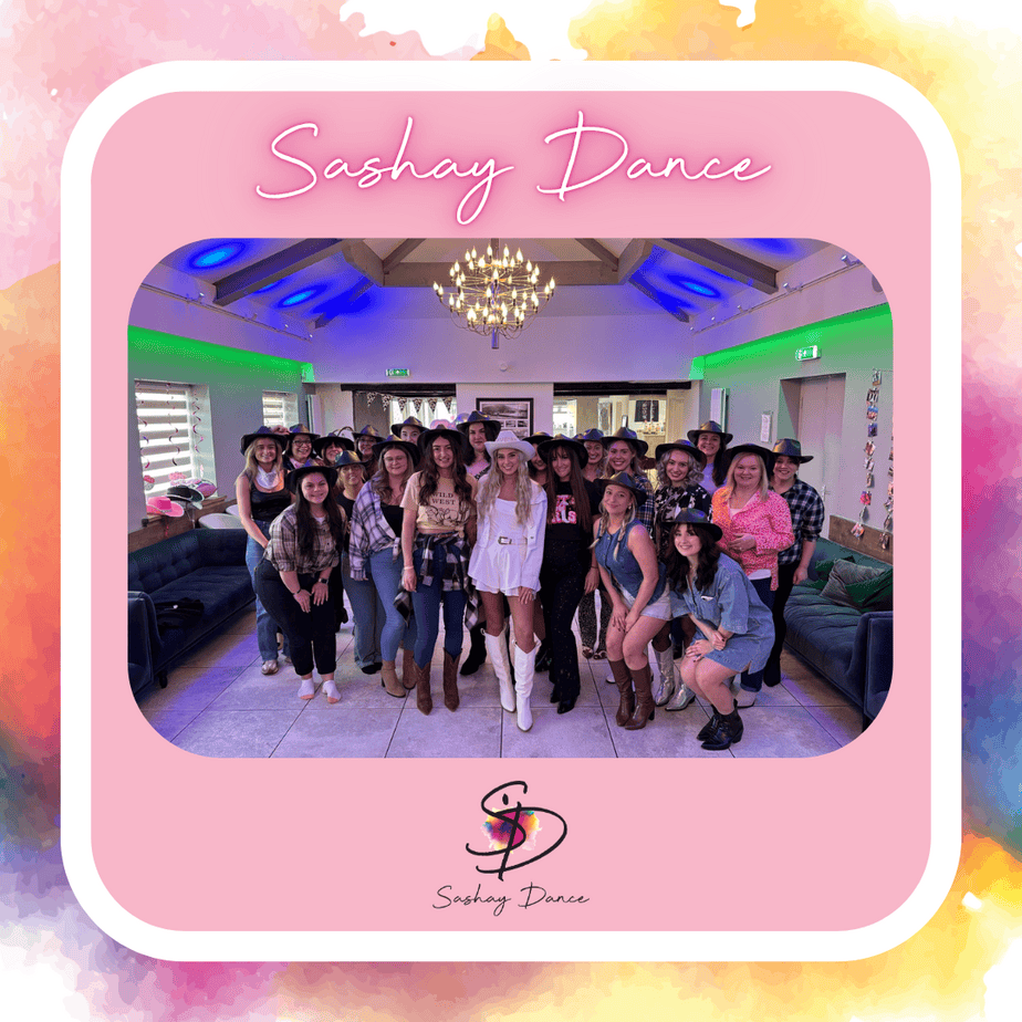 A group of ladies laughing and dancing together at a Sashay Dance hen party class