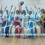 A hen party group laughing together at a Sashay Dance class in Newcastle city centre.