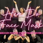 Hen do face masks: hen group holding personalised groom photo masks over their faces