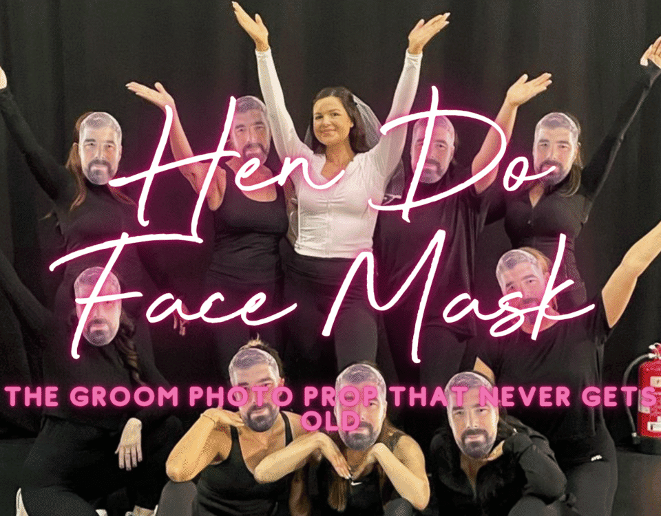 Hen do face masks: hen group holding personalised groom photo masks over their faces