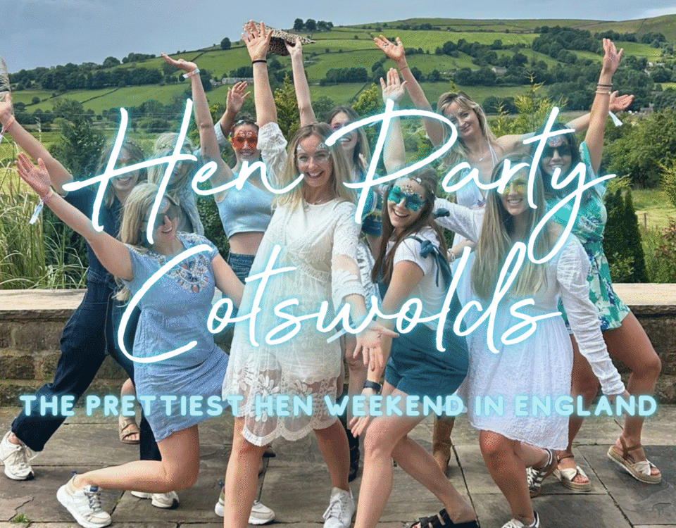 Hen party Cotswolds: hen group celebrating outside a honey-stone hen house